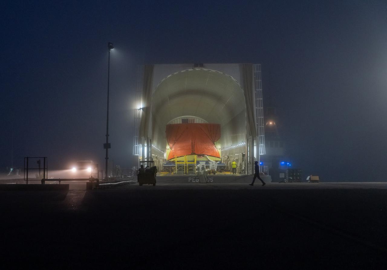 Teams at NASA’s Michoud Assembly Facility in New Orleans move the engine section flight hardware to the agency’s Pegasus barge Sunday, Dec. 4. The barge will ferry the engine section of NASA’s Space Launch System (SLS) rocket for Artemis III to the agency’s Kennedy Space Center in Florida. Once there, teams at Kennedy will finish outfitting the engine section, which comprises the tail-end of the rocket’s 212-foot-tall core stage, before integrating it to the rest of the stage. Beginning with production for Artemis III, NASA and core stage lead contractor Boeing will use Michoud, where the SLS core stages are currently manufactured, to produce and outfit the core stage’s five elements, and available space at Kennedy for final assembly and integration.